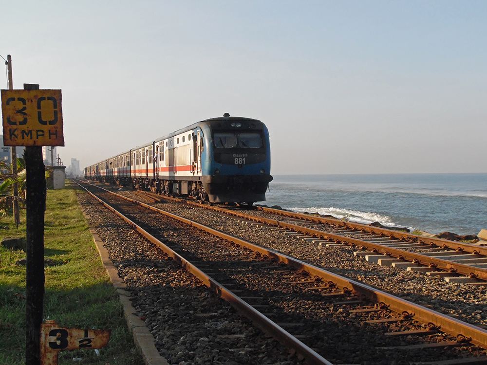 Train beside the Indian Ocean on the Coastal Line